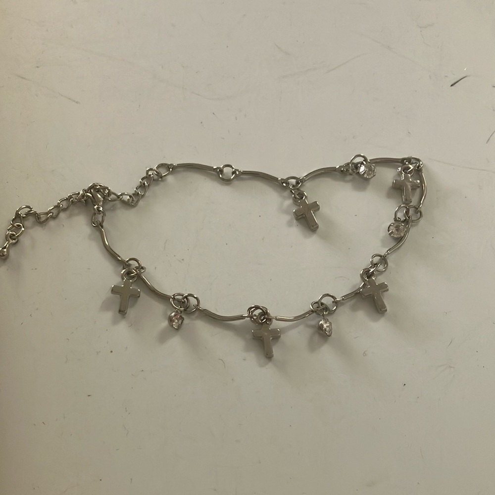 Hanging crosses bracelet